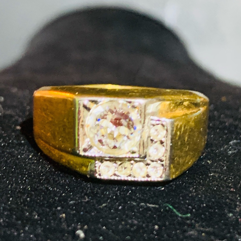 Men’s size 10 electroplated 18 k gold electroplated ring.